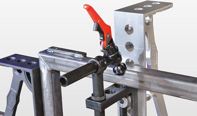 Quick-action clamping cylinder with clamping pads